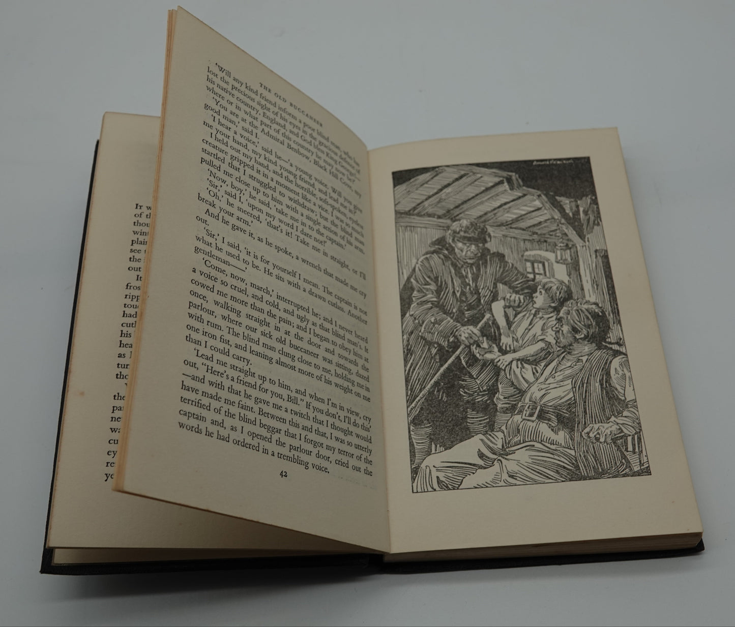 A lovely half leather pocket edition of Treasure Island, R.L. Stevenson, 1962