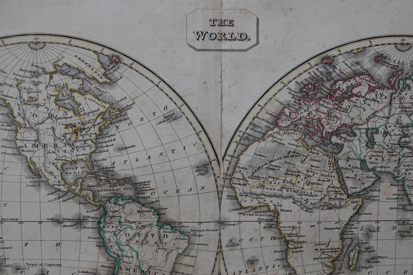 Historic map of the world's hemispheres, dating from 1824