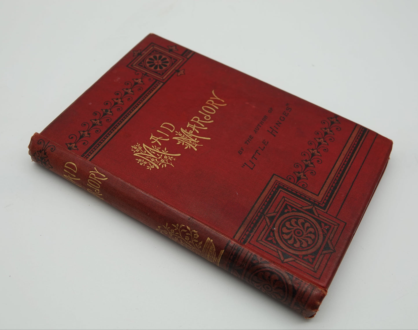 Maid Marjory, a lovely red cloth, gilted and embossed pocket book