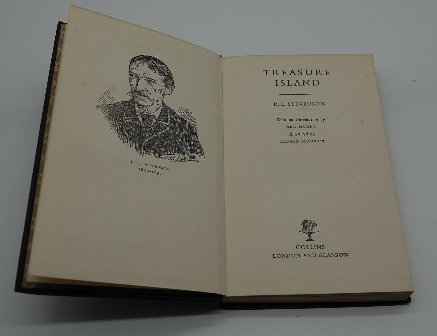 A lovely half leather pocket edition of Treasure Island, R.L. Stevenson, 1962