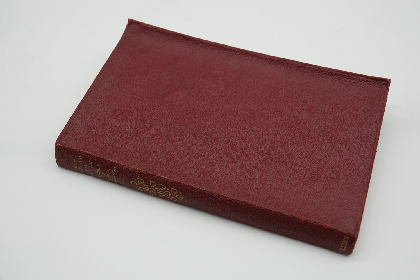 A half leather pocket edition of What Katy Did, Susan Coolidge, 1955 edition