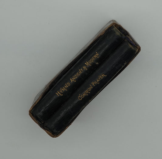 Here is a lovely scarce gift... Two leatherbound pocket books in a leather slip case, with a beautiful inscription