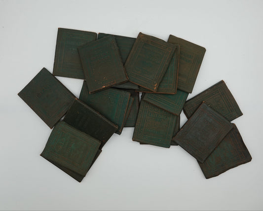 An incredible collection of 82 leather bound vintage miniature books....